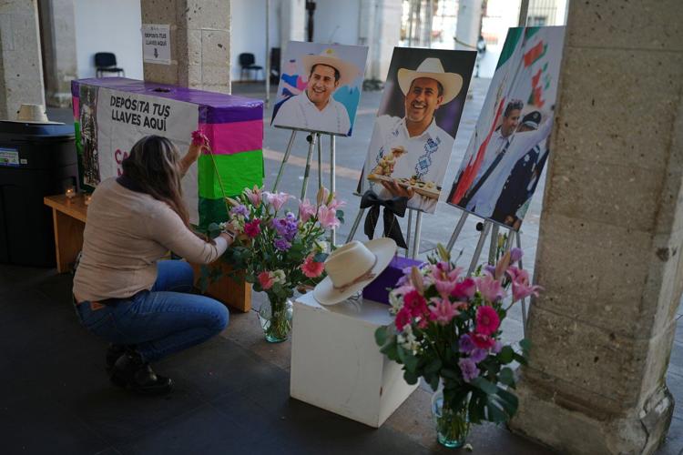 Authorities arrest 7 bodyguards in connection with a Mexican mayor's assassination