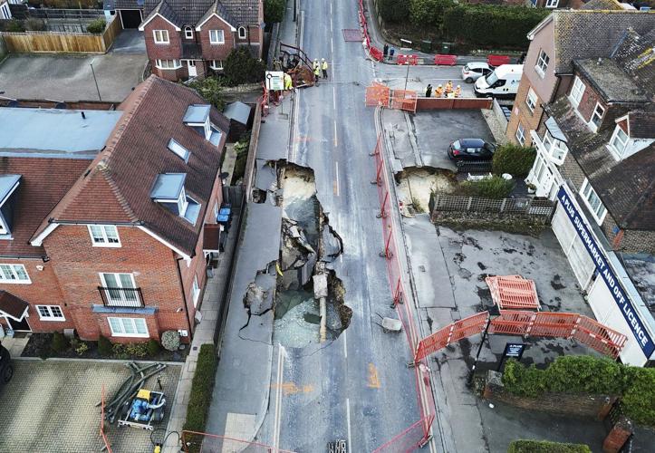 Sinkhole opens up on the main street of an English village