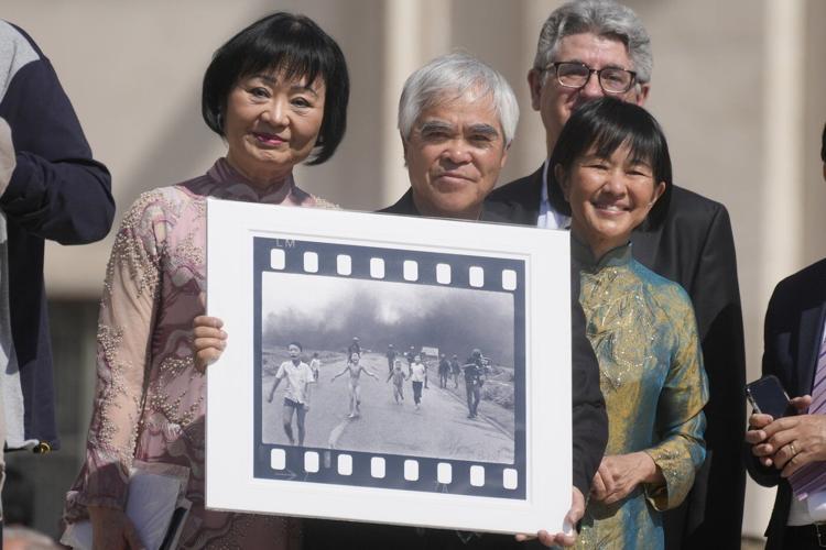 Photo group says it has 'suspended attribution' of historic Vietnam picture because of doubts