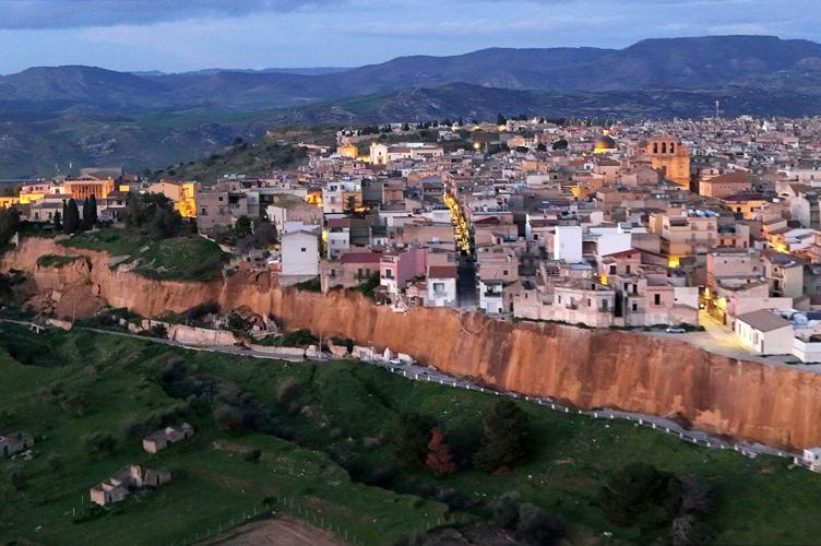Huge landslide cleaves off the edge of a town in Sicily and forces the evacuation of 1,500 people