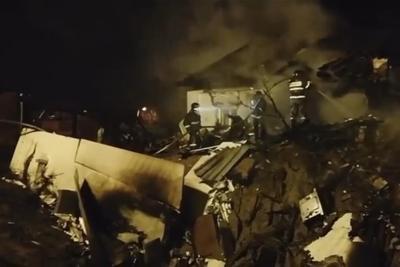 Russian warplane falls on building in Siberia; 2 pilots die