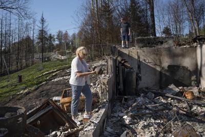'We're not going home:' Family flees 'apocalyptic' wildfire, aims to build back safer