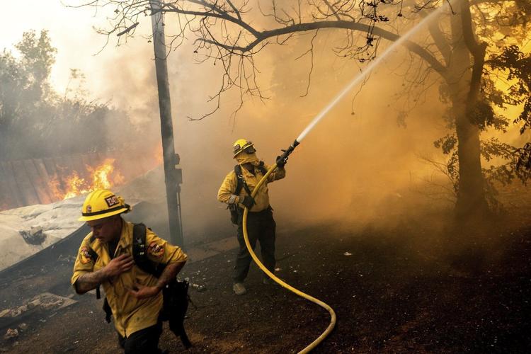 A wildfire sweeps through a historic California gold-mining town in photos