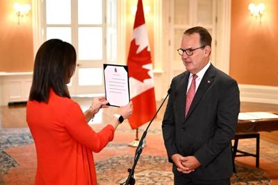 Liberal House leader Steven MacKinnon sworn in as labour minister, replacing O'Regan