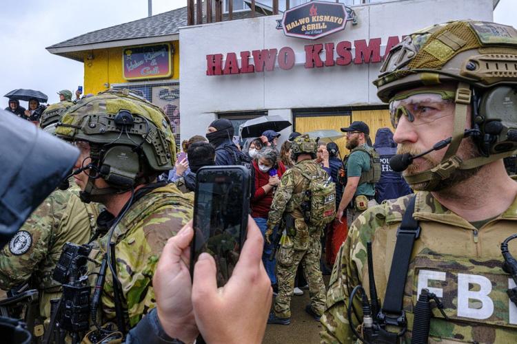 Federal officers in tactical gear went into a Latino community in Minneapolis. A protest followed