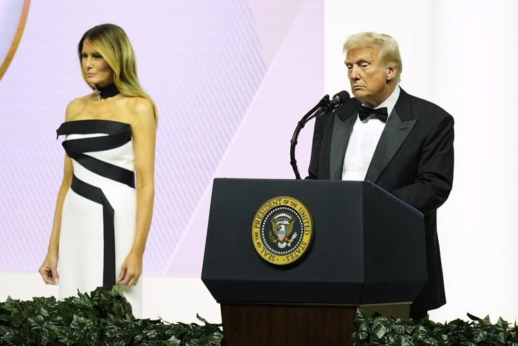 The Latest: Trump seeks to reshape American institutions with barrage of executive orders