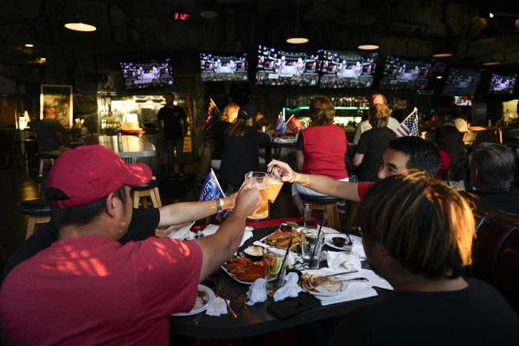 Americans are exhausted by political news. TV ratings and a new AP-NORC poll show they're tuning out