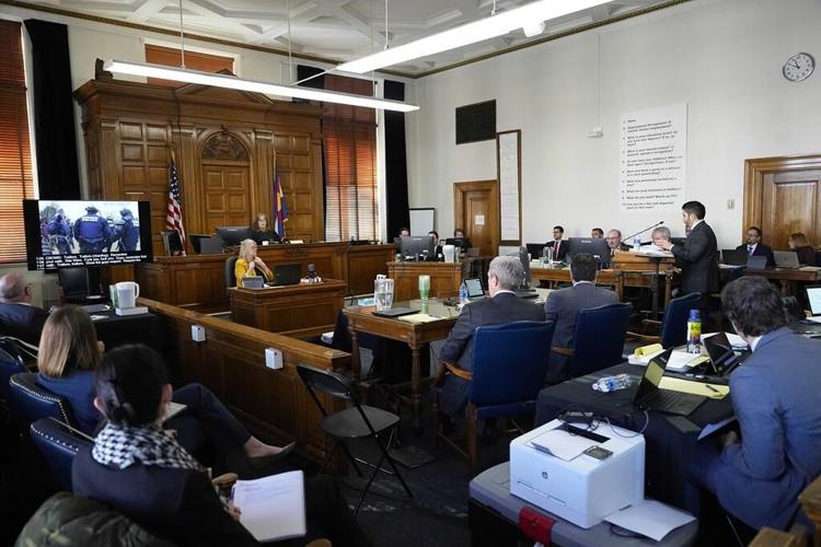 Lawyers argue whether the Constitution’s ‘insurrection’ clause blocks Trump from the 2024 ballot