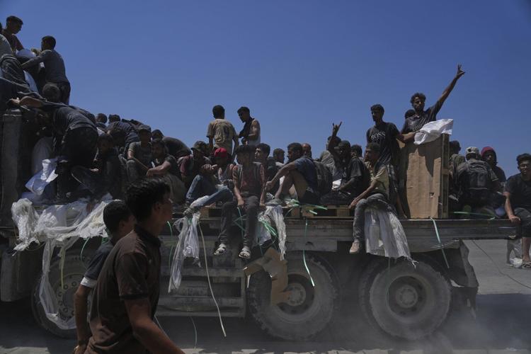 The Latest: Trump meets Starmer and disagrees with Netanyahu's claim of no starvation in Gaza