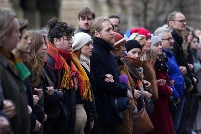 Students march in Prague to honor the victims of the worst mass killing in Czech history