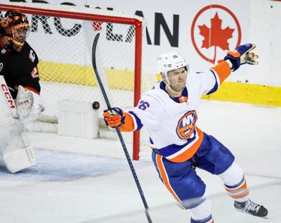 New York Islanders halt losing skid with 5-4 shootout win over Calgary Flames
