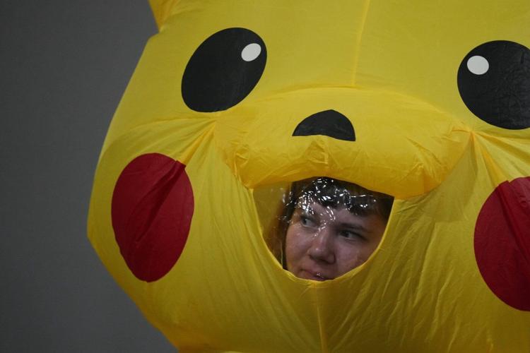 Protesters in Pikachu costumes demand Japan end fossil fuel financing at UN climate conference