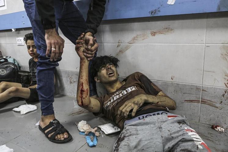 Gaza's doctors struggle to save hospital blast survivors as Middle East rage grows