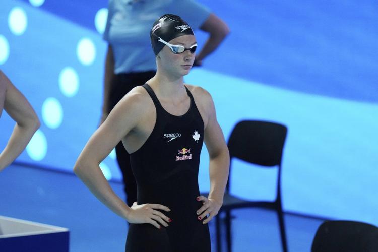 McIntosh starts her quest for five gold medals at swim world championships