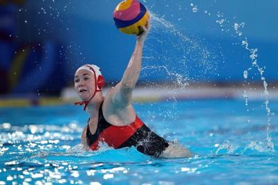 Canada beats South Africa 21-6 to advance to women's water polo quarterfinals