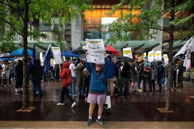 ϳԹ writers picket in support of U.S. counterparts, say there's uncertainty here