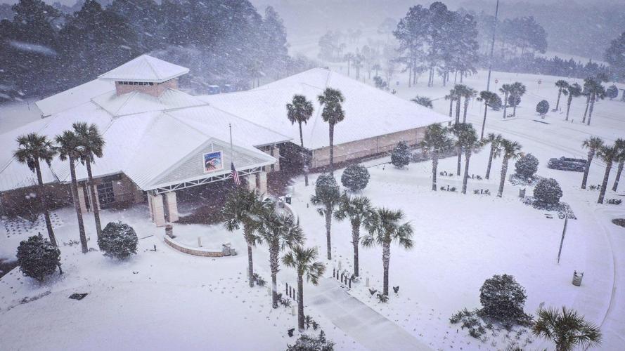 Winter storm that dropped record-breaking snow in New Orleans spreads into Florida and the Carolinas