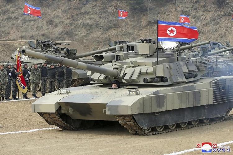 North Korea's Kim drives new-type tank during drills and calls for efforts to prepare for war
