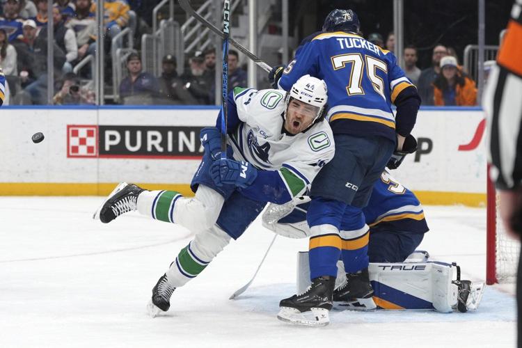 Broberg scores in OT to lift Blues over Canucks 4-3 for 4th straight win