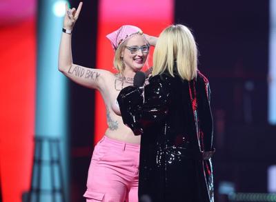 'Just tell Avril I'm not mad,' says topless Junos protester after being charged