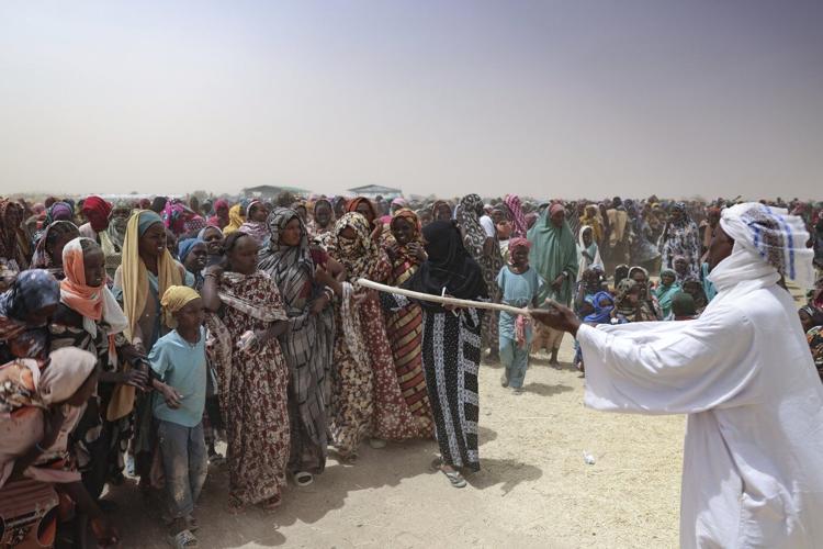 Photos show Sudanese refugees who have fled to neighboring Chad in their hundreds of thousands