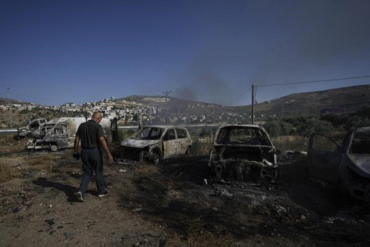 Israel beefs up troop presence in West Bank after Palestinian attack that killed 4 civilians