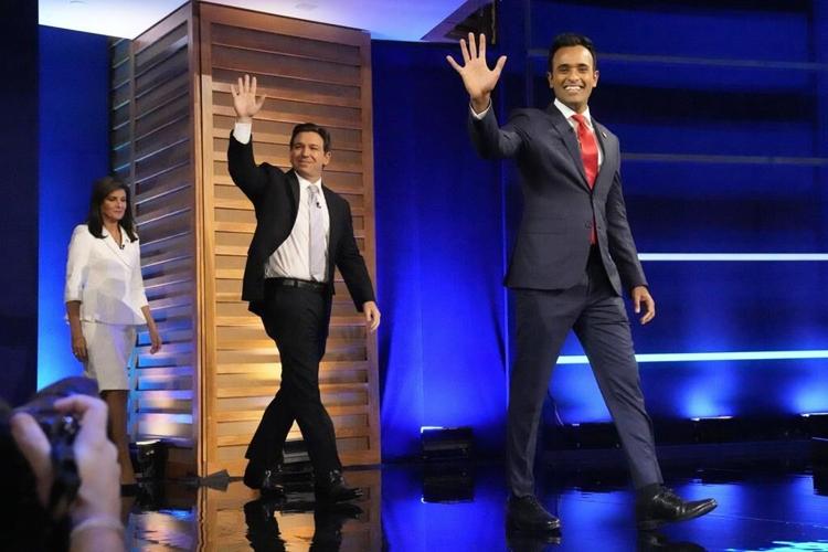 Four GOP candidates will be on the debate stage, while Trump holds a fundraiser. Follow live updates