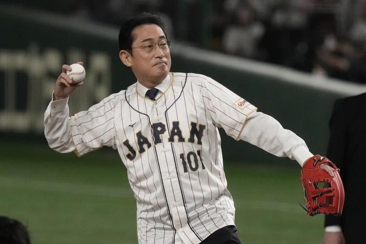 Kishida makes 1st pitch in Japan game with South Korea