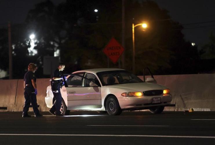 Dallas officer killed, 2 wounded by man who is fatally shot after highway chase, police say