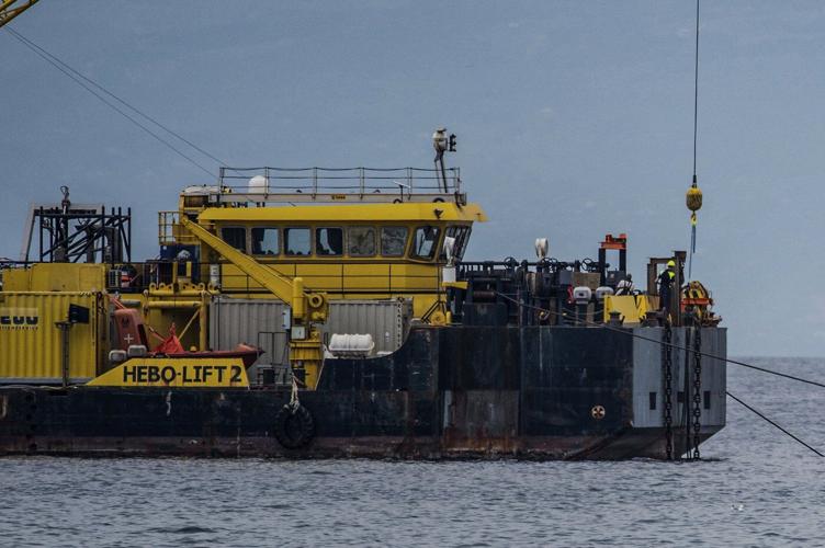The recovery of superyacht off Sicily is suspended after a diver dies