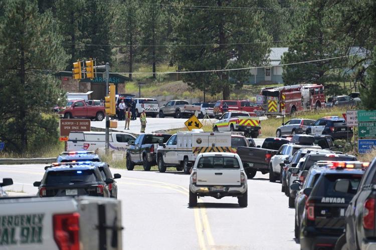 Authorities say a boy shot two other teens then himself at a suburban Denver high school