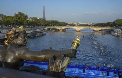 Water quality concerns halt Paris Olympics swimming test in the Seine