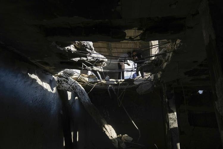 Patients and staff leave Gaza's biggest hospital, and dozens are killed at a crowded refugee camp