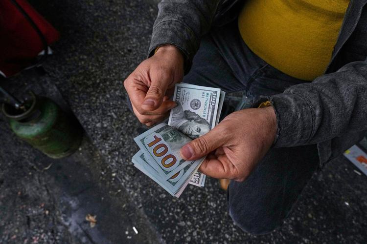 Iran's rial currency plummets to new low, sparking fears of higher food prices