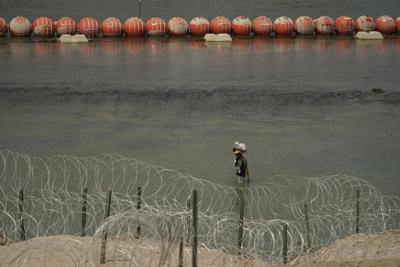Future of Texas' migrant-blocking buoys may hinge on whether the Rio Grande is 'navigable'