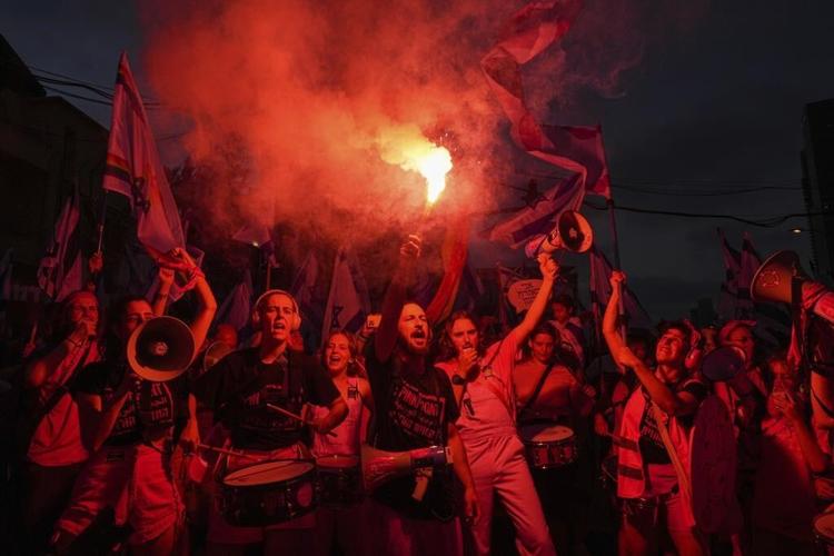 Israel's governing coalition presses ahead with plan to overhaul courts ahead of expected protests