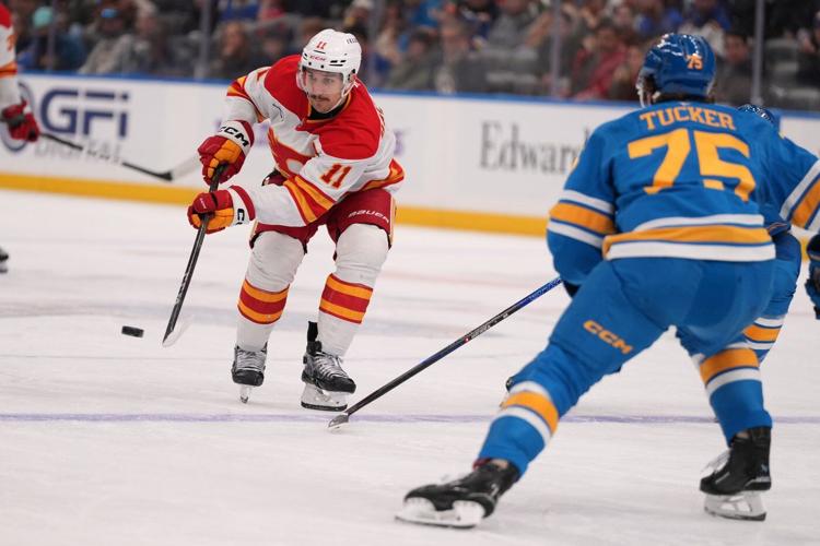 Walker, Binnington lead Blues to 3-2 win over struggling Flames