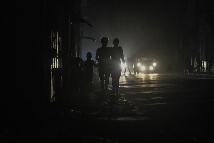 Cubans struggle with an extended power outage and a new tropical storm