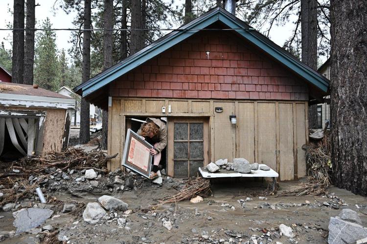 Photos show California homes buried in mud and debris during Christmas storms