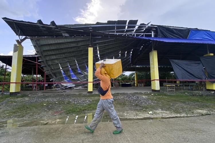 Strong earthquake that sparked a tsunami warning leaves 1 dead amid widespread panic in Philippines