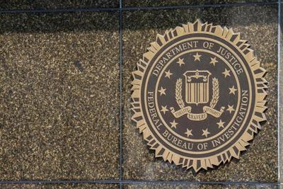 Police searching for two people accused in FBI agent carjacking in Washington