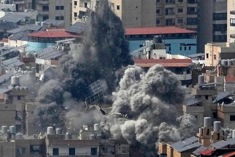 The Latest: Israel hammers Beirut and Tehran as Iran attacks more Israeli targets