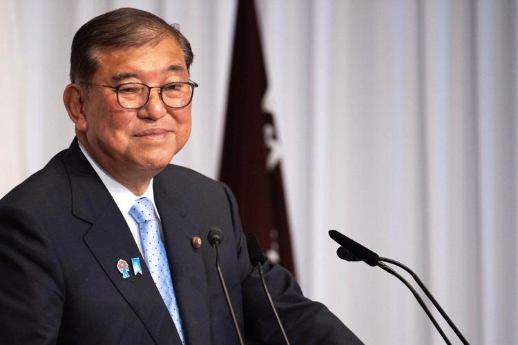 Japan's Ishiba says he'll stay in office to tackle inflation and US tariffs despite election loss