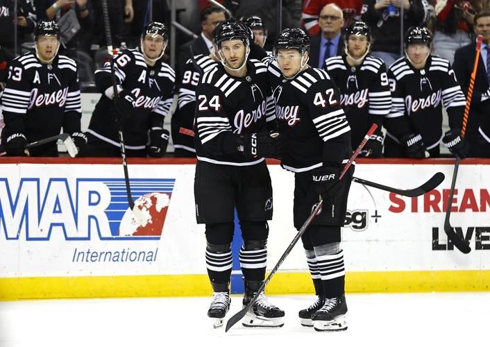 Miller, Pettersson score twice as Canucks burn Devils 6-4