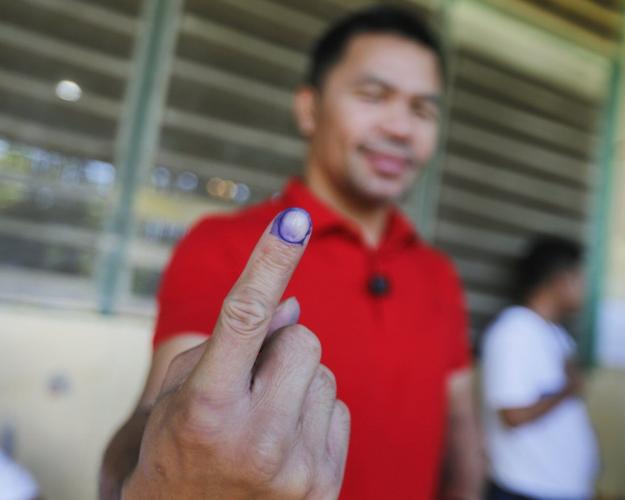 Voting ends in Philippines midterm elections, with detained ex-President Duterte among candidates