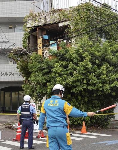 A powerful quake hits off Japan's coast, causing minor injuries but prompting new concerns