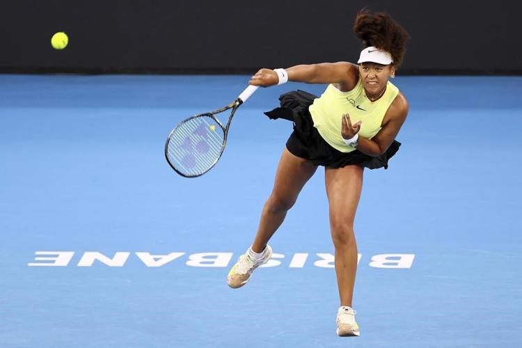 Naomi Osaka returns to elite tennis from a maternity break and wins her first match in Brisbane