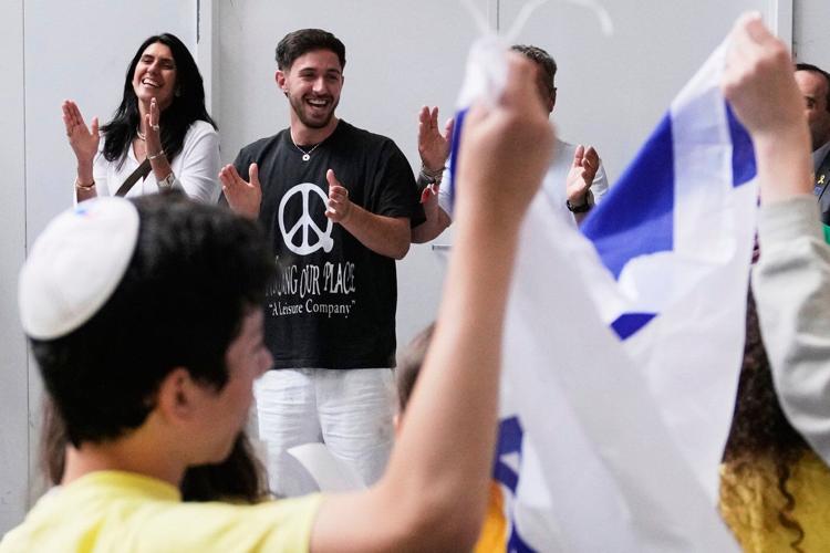 Feted by school children, tossing out a first pitch: Former Israeli hostage grapples with celebrity