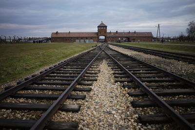 Barstool Sports founder retracts Auschwitz tour offer to customer in antisemitic sign incident