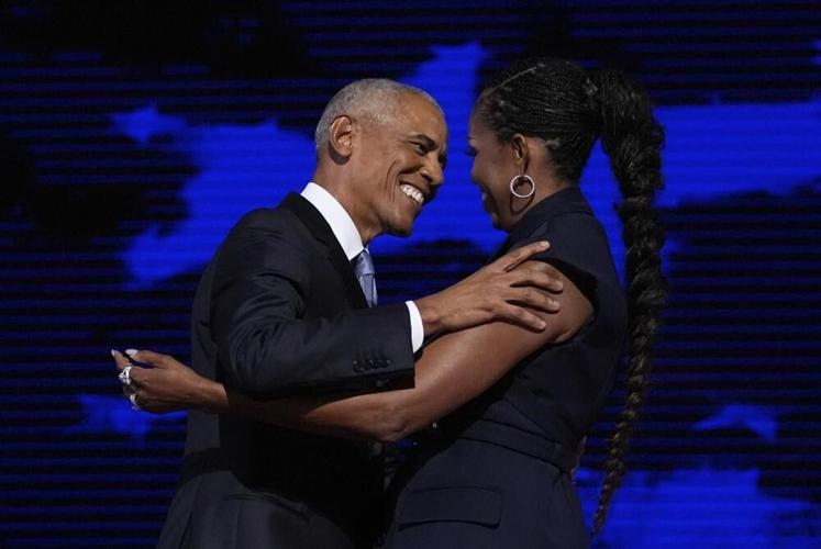 A double dose of Obama firepower, a doting spouse and a dance party: Takeaways from Day 2 of the DNC